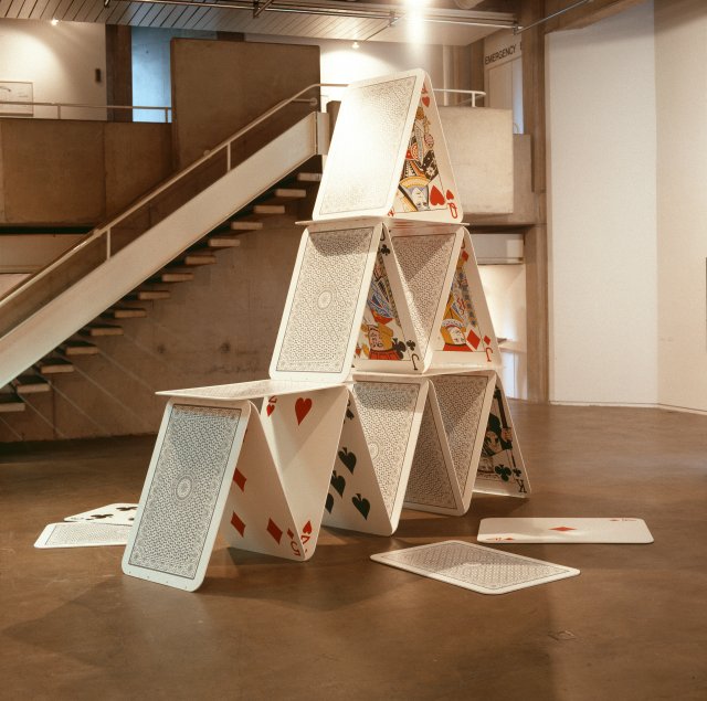 Safe as Houses.  Catherine Kelly.  Douglas Hyde Gallery, Dublin. 22 laquered boards screenprinted on both sides (46" x 30" each) fashioned to resemble a house of playing cards. 10"8"h x 13"8"w x 11'5